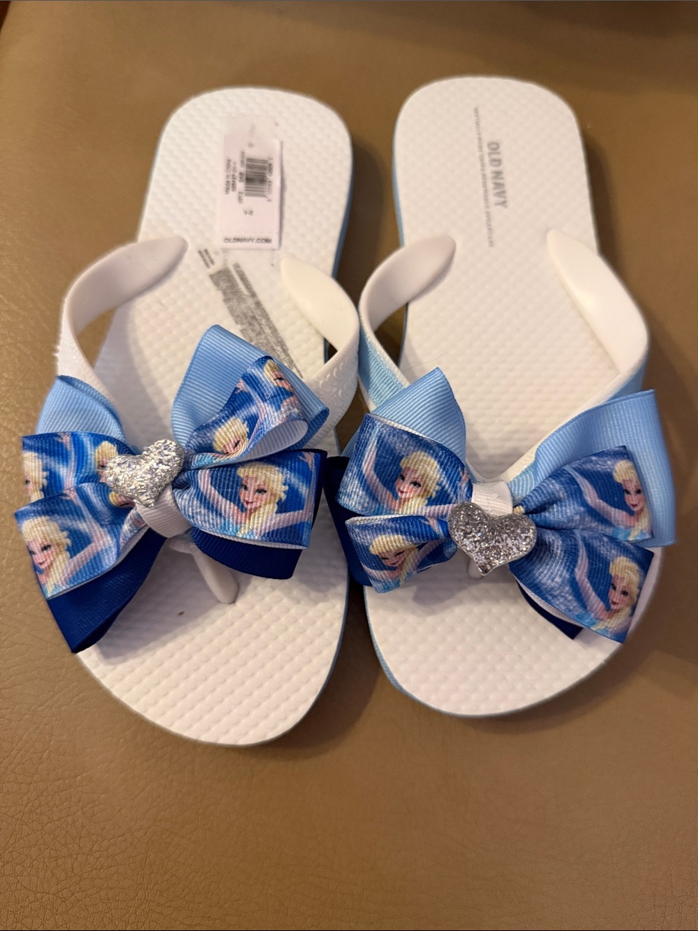 Old Navy White Flip-Flops with Blue Frozen Bow and Silver Heart